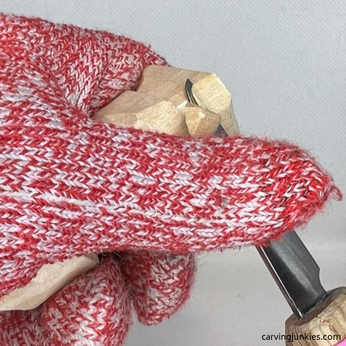 Shaping the legs on wood carved valentine gnome