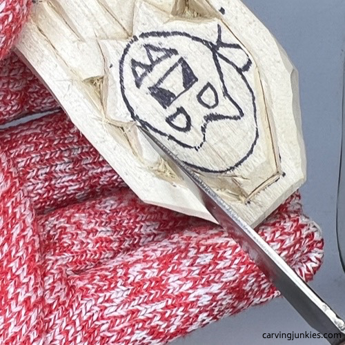 Digging wood out on wood carved vampire