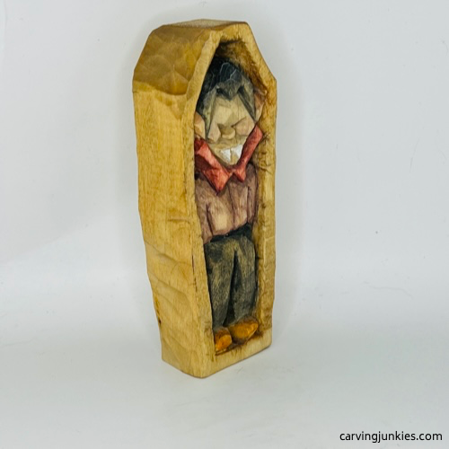 Right view of painted wooden vampire