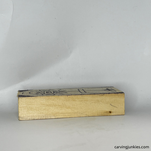 Side view of wood carved vampire wood block