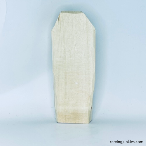 Back view of unpainted wood carved vampire