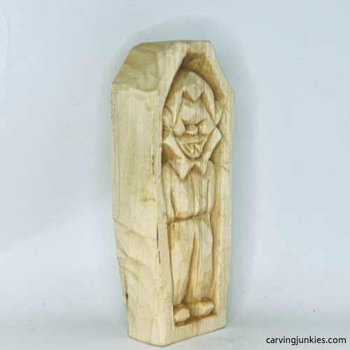 Right view of unpainted wood carved vampire