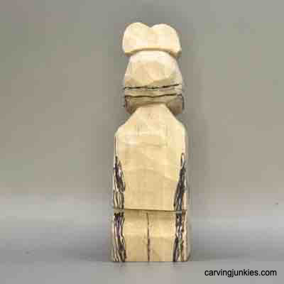 Back details are sketched on wood carved Viking