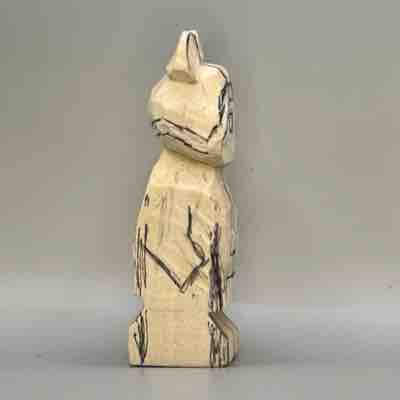 Right details are sketched on wood carved Viking