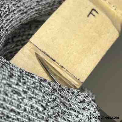 Separating the shoes on wood carved Viking