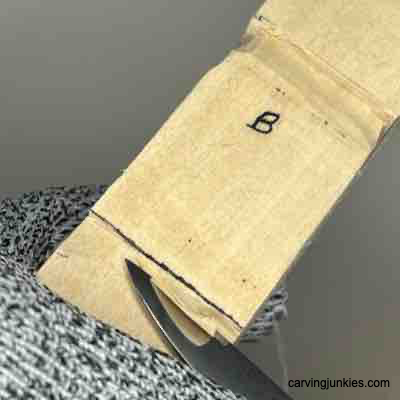 Carving the back of knees on wood Viking 