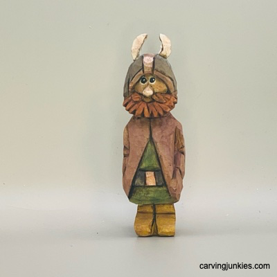 Front of painted wood carved Viking