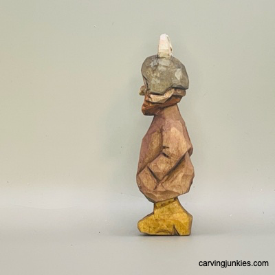 Left view of painted wood carved Viking