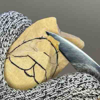 Meeting stop cut on wood carved Viking