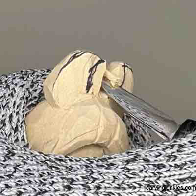 Refining horns on wood carved Viking