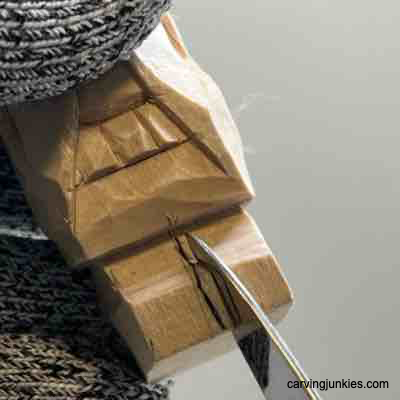 Splitting legs on wood carved Viking