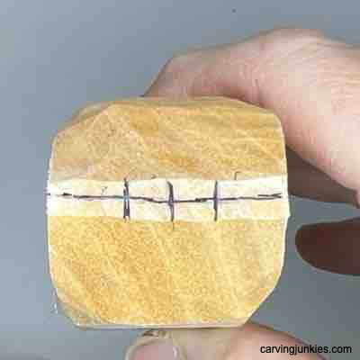 Tick lines are drawn on wood block