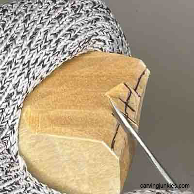 Making a wide V-cut on wood carving