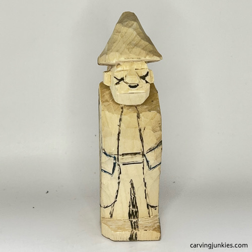 Sketched details on wood carved wizard Added drawn details for wood carved wizard