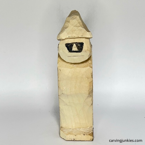 Added nose guideline on wood carved wizard Nose box drawn on wood carved wizard