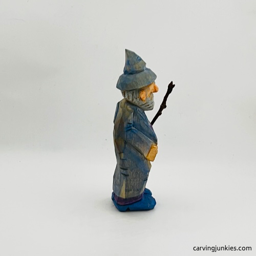 Painted right side of wood carved wizard Painted right side of wood carved wizard