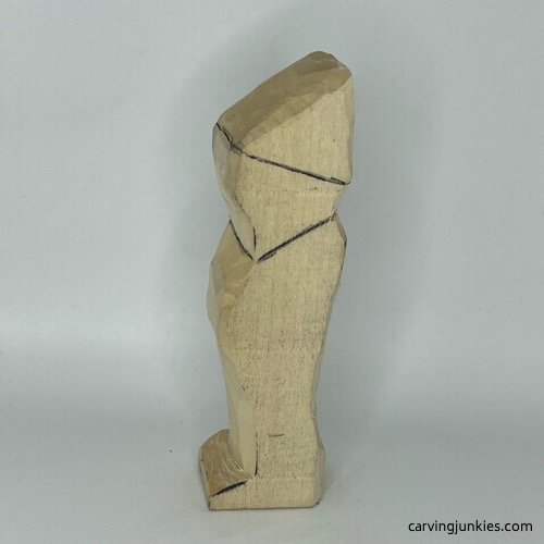 Left side of head on wood carved wizard Left view of head on wood carved wizard