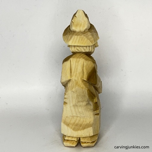Back side of wood carved wizard Back view of wood carved wizard