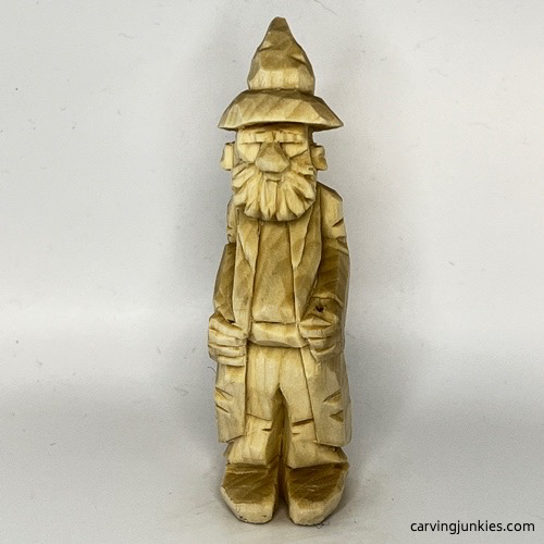 Front side of wood carved wizard Front view of wood carved wizard
