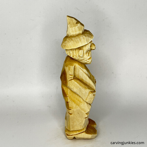 Right side of wood carved wizard Right view of wood carved wizard