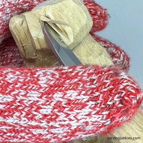 Shaping back of ears on wood carved dog