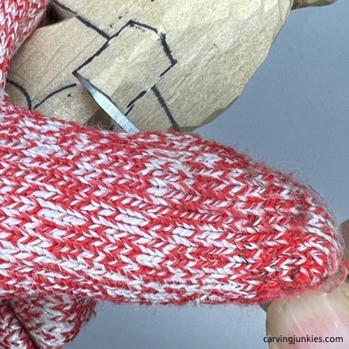 Separating the tail on wood carved dog