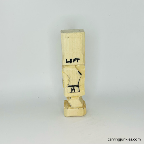 Left arm is separated on carved wooden knight