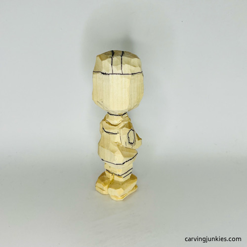 Back view of details on carved wooden knight