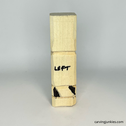 Wood marked for removal on left side to carve a wooden knight