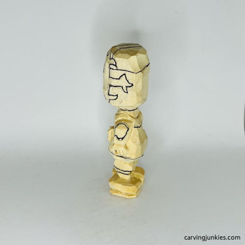 Left side of details on carved wooden knight