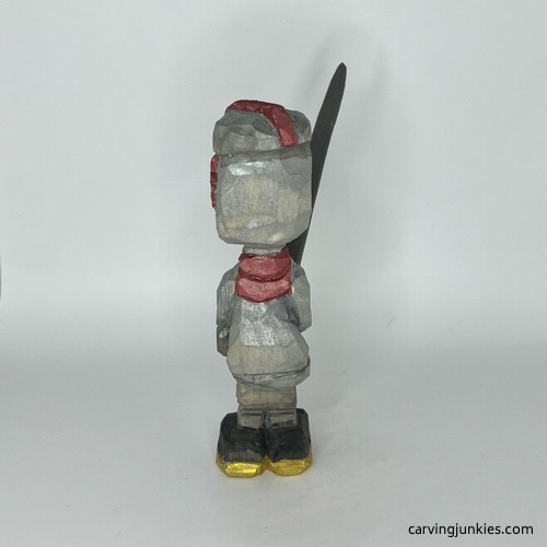 Back view of painted wooden knight