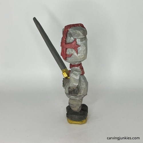 Left view of painted wooden knight