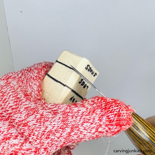 Making a stop cut for carving a wooden knight