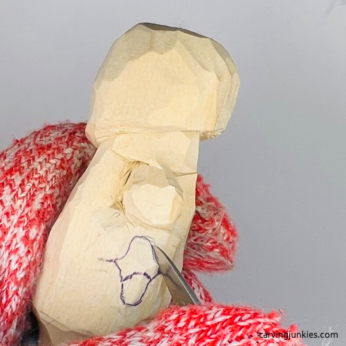 Separating mouth on wooden mushroom carving