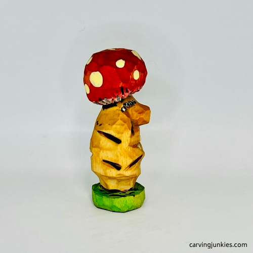 Painted rignt of wood mushroom carving
