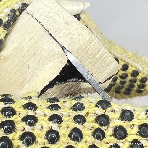 Cutting base on pea pod wood carving Separating base on pea pod wood carving