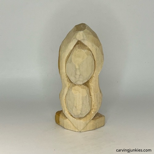 Rounded facets on pea pod wood carving Faces are shape for pea pod wood carving