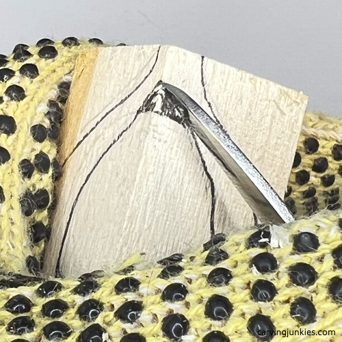 Making chip cut on pea pod wood carving Making pyramid cut on pea pod wood carving