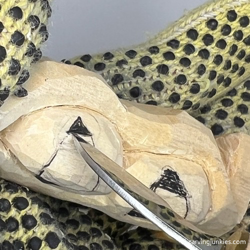 Making chip cut on pea pod wood carving Making nose pyramid cut on pea pod wood carving