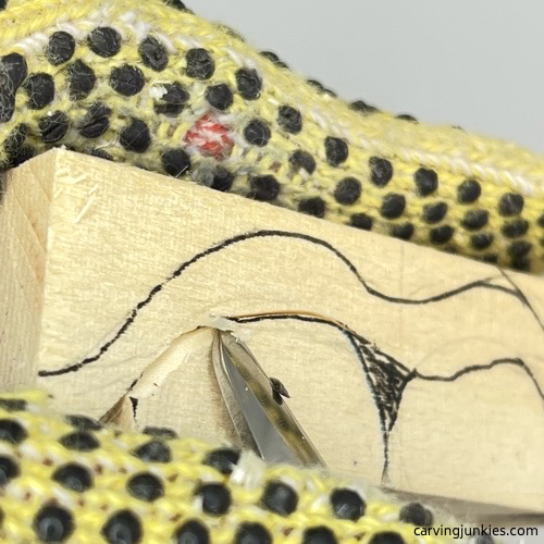 Carving wood on pea pod wood carving Making slicing cut on pea pod wood carving