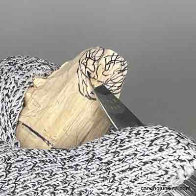 Carve a wooden turkey that’ll steal the spotlight—click here! Carving back of the head on wooden turkey