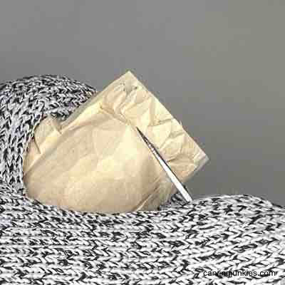 Turn a block of wood into a Thanksgiving turkey centerpiece Separating the feet on wooden turkey