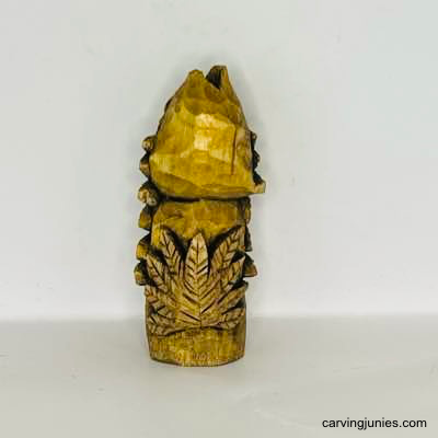 Make this turkey caricature your own—start wood carving with our easy guide! Back view of painted wooden turkey