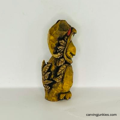 Turn wood into holiday magic with this fun wooden turkey carving tutorial! Right view of painted wooden turkey