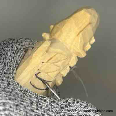 Create a wooden gobbler turkey with personality—follow our guide! Separating feathers on back of wood turkey