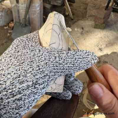 Don’t miss the ultimate guide to carving a wooden turkey with flair! Slicing off wood to carve head of turkey