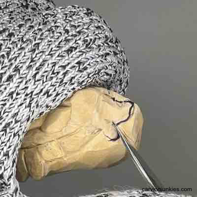 Learn to carve a wooden turkey that brings laughter and cheer! Using V-cut to separate top of wood turkey head