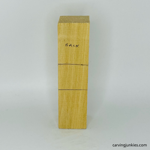 Back view of little man caricature carving guidelines