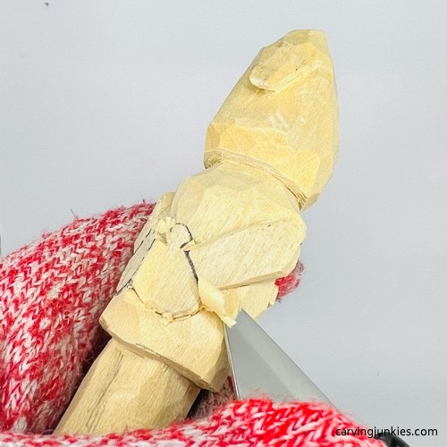 Refining back of wooden gnome