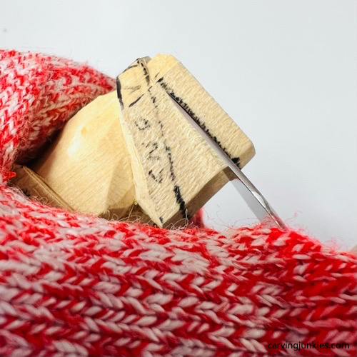Carving base on wooden gnome